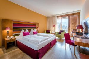 Postel nebo postele na pokoji v ubytování Hotel Therme Meran - Terme Merano