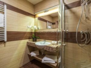 Kúpeľňa v ubytovaní Hotel Zakopane Wellness & SPA ex Korona Tatr