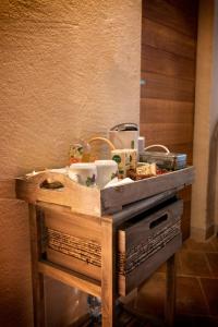 a wooden counter with a sink in a room at Larocchettina in Castiglione dʼOrcia