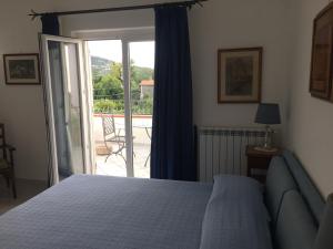 Ένα ή περισσότερα κρεβάτια σε δωμάτιο στο La Ninfa Di Capri +20 φωτογραφίες