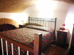 Ένα ή περισσότερα κρεβάτια σε δωμάτιο στο Appartamento La Loggia