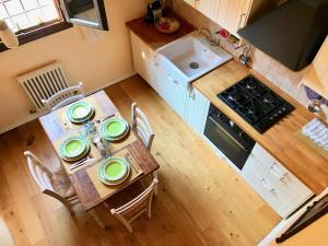 Kuhinja oz. manjša kuhinja v nastanitvi Without Name Apartment