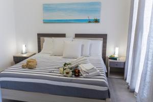 Katil atau katil-katil dalam bilik di MareinSicilia: Talia Residence +37 gambar
