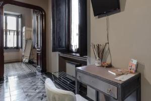 TV a/nebo společenská místnost v ubytování L'Ortodellerose
