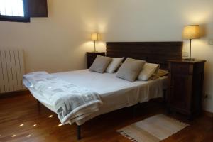 Postel nebo postele na pokoji v ubytování Agriturismo Molino Nuovo