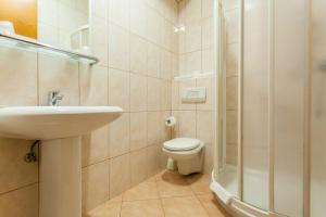 Koupelna v ubytování Hotel Adria