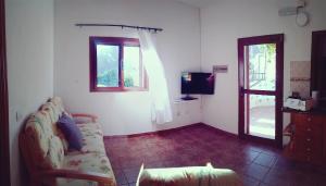 Μια τηλεόραση ή/και κέντρο ψυχαγωγίας στο Casas Blancas - Suite 2