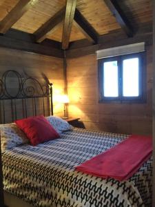 Un pat sau paturi într-o cameră la Casa Rural El Hórreo
