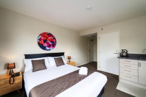 Postel nebo postele na pokoji v ubytování 123 Motel