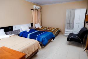 Cama o camas de una habitación en Class Apart Hotel