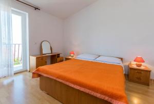 Postel nebo postele na pokoji v ubytování Apartments Matejka I