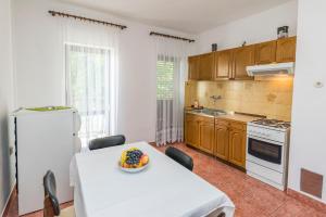 Kuchyň nebo kuchyňský kout v ubytování Apartments Matejka I