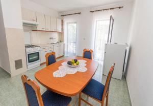 Kuchyň nebo kuchyňský kout v ubytování Apartments Matejka