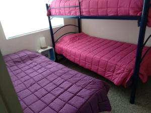 Postel nebo postele na pokoji v ubytování Departamento familiar en Viña del Mar + 13 fotografií