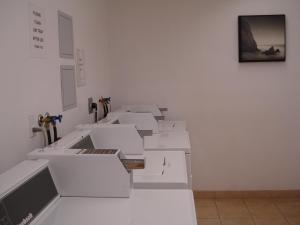 een kamer vol witte dozen aan een muur bij Days Inn by Wyndham Chetwynd in Chetwynd