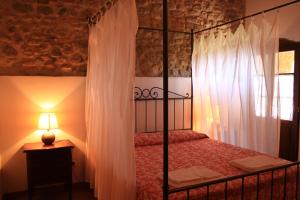 Postel nebo postele na pokoji v ubytování Agriturismo Ragoncino