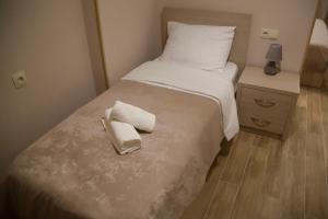 Voodi või voodid majutusasutuse Family Hotel Triston toas