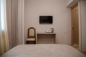 Voodi või voodid majutusasutuse Family Hotel Triston toas