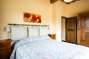Postel nebo postele na pokoji v ubytování Agriturismo Il Poderaccio