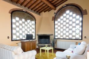 TV a/nebo společenská místnost v ubytování Agriturismo Il Poderaccio