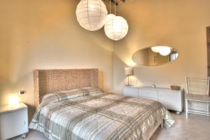 Postel nebo postele na pokoji v ubytování Agriturismo Il Poderaccio