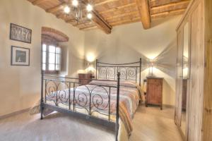 Postel nebo postele na pokoji v ubytování Agriturismo Il Poderaccio