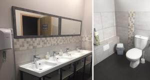 a bathroom with two sinks and a toilet and a mirror at Hostel City Center Gdynia in Gdynia