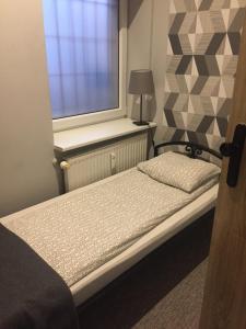 Posteľ alebo postele v izbe v ubytovaní Hostel City Center Gdynia