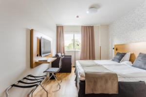 Postel nebo postele na pokoji v ubytování Hotel Spekeröd