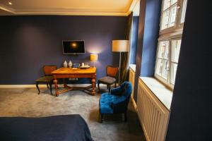 TV a/nebo společenská místnost v ubytování Boutique Hotel Classico Bremen