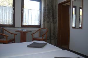 En eller flere senge i et værelse på Niedereher Mühle + 1 billede