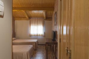 Posteľ alebo postele v izbe v ubytovaní Hotel-Restaurante La Sima
