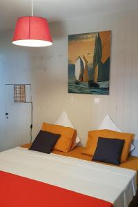 Postel nebo postele na pokoji v ubytování Casa vue mer - piscine privée - Destination St-Leu