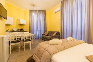 Postel nebo postele na pokoji v ubytování B&B Trianon