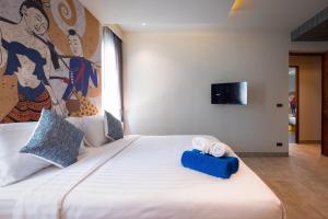 Postel nebo postele na pokoji v ubytování Karon Beach Pool Villa - Sha Extra Plus