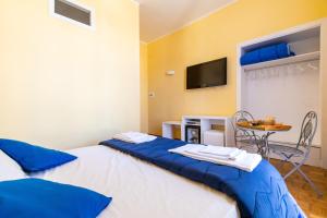 Postel nebo postele na pokoji v ubytování B&B Trianon