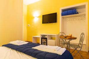 Postel nebo postele na pokoji v ubytování B&B Trianon