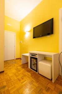 TV a/nebo společenská místnost v ubytování B&B Trianon
