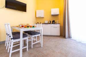 Kuchyň nebo kuchyňský kout v ubytování B&B Trianon
