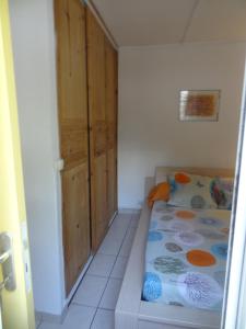 Postel nebo postele na pokoji v ubytování Residence Virginie