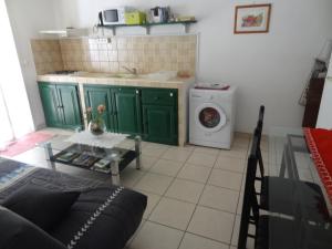 Kuchyň nebo kuchyňský kout v ubytování Residence Virginie