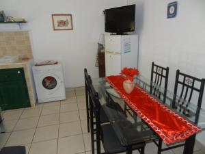 Kuchyň nebo kuchyňský kout v ubytování Residence Virginie