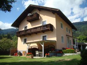 a large house with a balcony on the side of it at Apartment Lilly in Lienz