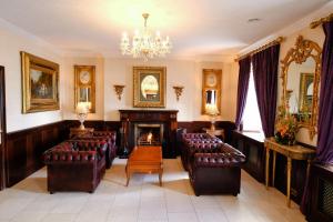 Zona de estar de Dooly's Hotel