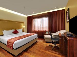 A television and/or entertainment centre at The Fern Residency, Jaipur