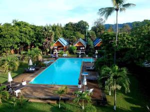 an image of a swimming pool at a resort at Lanta Sunny House in Ko Lanta