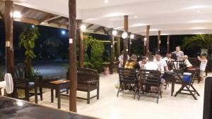 A restaurant or other place to eat at Lanta Sunny House - SHA Extra Plus