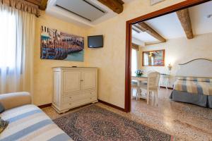 A bed or beds in a room at Hotel Mercurio