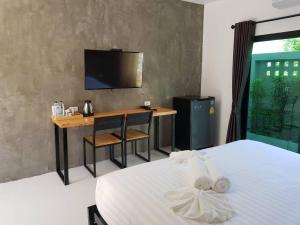 Gulta vai gultas numurā naktsmītnē Beloft Hotel