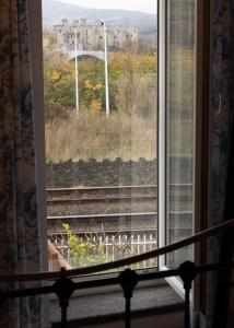 Photo de la galerie de l'établissement Platform 13 Railway Cottage, à Conwy 16 autres photos